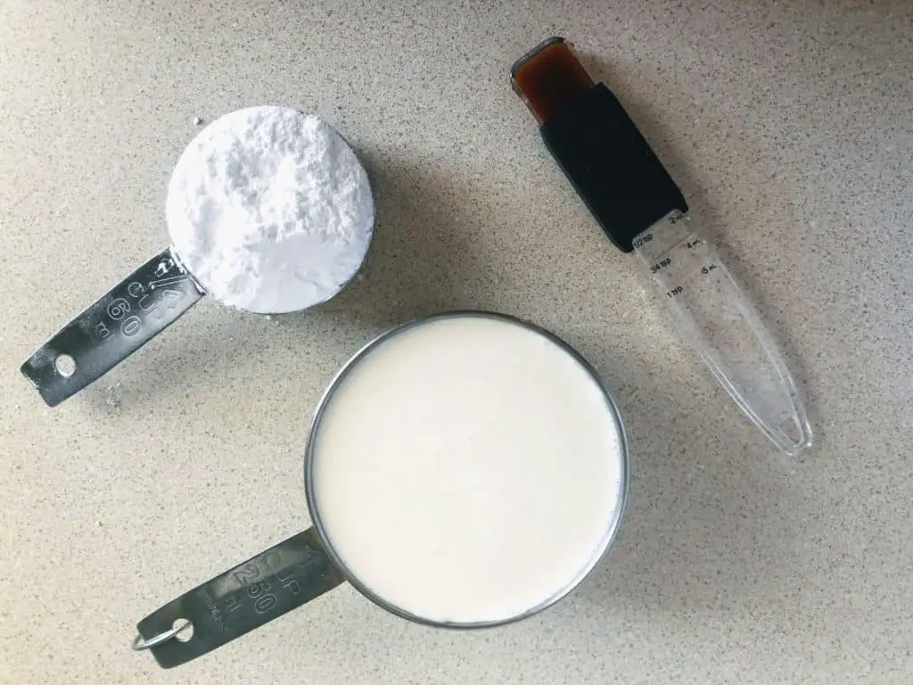 3 ingredient whipped cream. vanilla, powdered sugar, and heavy cream