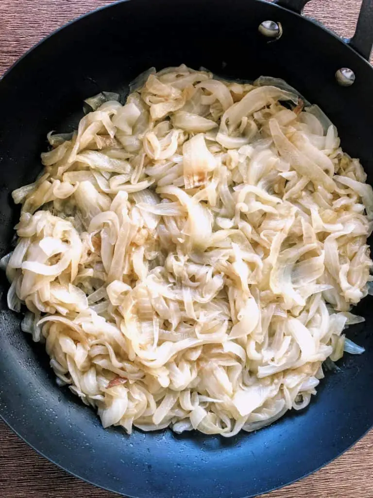 caramelizing onions cast iron vs. carbon steel best pan