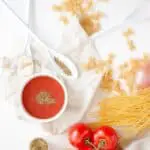 making a sauce; tomatoes pasta spoon