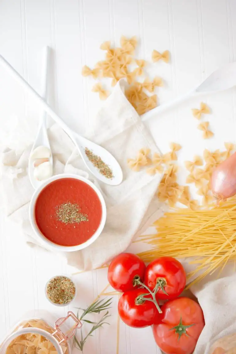 making a sauce; tomatoes pasta spoon