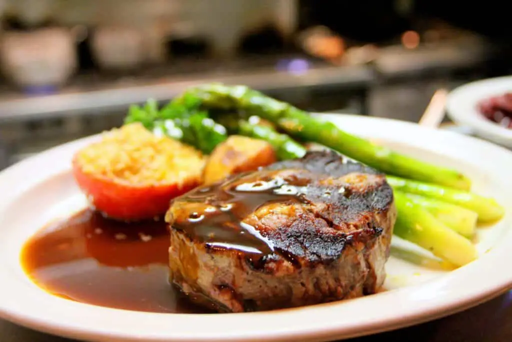 brown sauce - steak on a plate