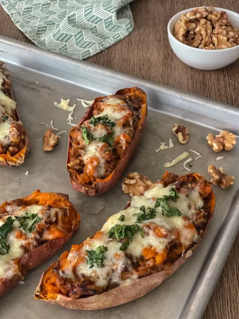 brown butter baked sweet potatoes on a pan